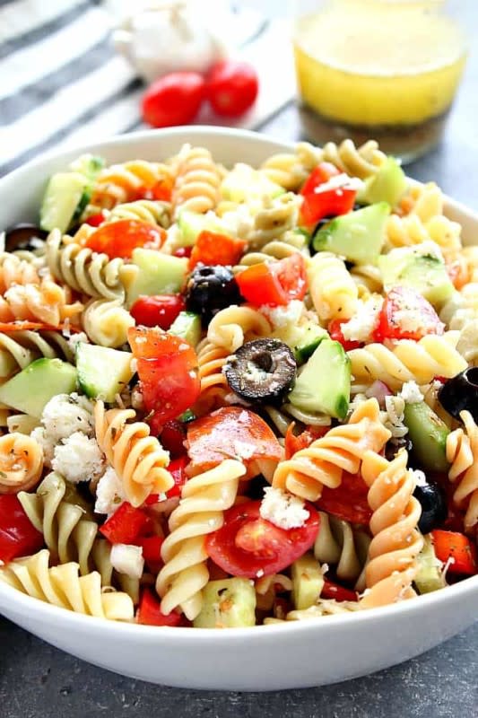 <p>Crunchy Creamy Sweet</p><p>Italian pasta salad recipe with pepperoni, cherry tomatoes, cucumber, olives, and fresh mozzarella cheese. A perfect side dish to your summer dinners!</p><p><strong>Get the recipe: <a href="https://www.crunchycreamysweet.com/italian-pasta-salad/" rel="nofollow noopener" target="_blank" data-ylk="slk:Italian Pasta Salad;elm:context_link;itc:0;sec:content-canvas" class="link "><em>Italian Pasta Salad</em></a></strong></p>