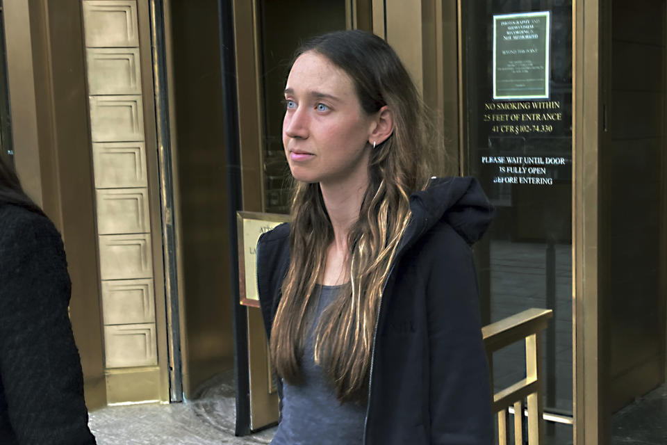 FILE - Charlie Javice, of Miami Beach, Fla., leaves Manhattan federal court, Tuesday, April 4, 2023, in New York, after signing a $2-million bond to remain free on charges that she duped J.P. Morgan Chase with fake records to acquire Frank, her student loan assistance startup company, for $175-million. The fraud case against Javice has taken a step toward trial with an arraignment on an indictment returned in a New York court. Javice pleaded not guilty on Monday, May 22, 2023, to an indictment returned late last week in Manhattan federal court. (AP Photo/Lawrence Neumeister, File)