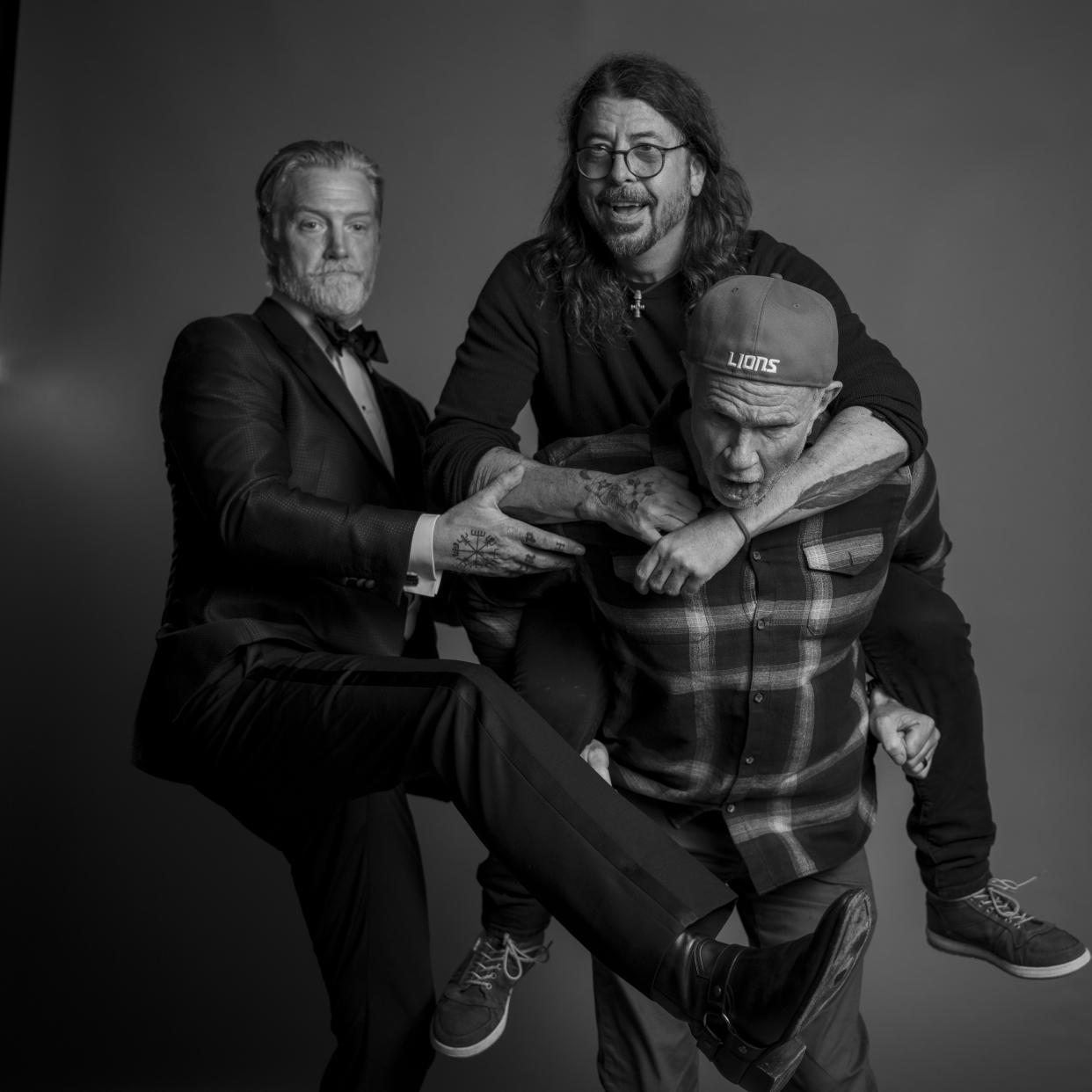 josh homme, dave grohl and chad smith