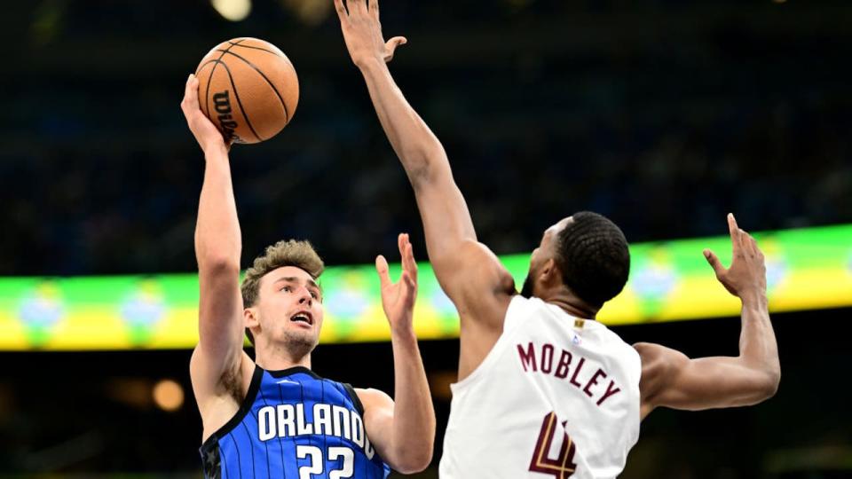 <div>ORLANDO, FLORIDA - MAY 03: Franz Wagner #22 of the Orlando Magic shoots the ball against <a class="link " href="https://sports.yahoo.com/nba/players/6514/" data-i13n="sec:content-canvas;subsec:anchor_text;elm:context_link" data-ylk="slk:Evan Mobley;sec:content-canvas;subsec:anchor_text;elm:context_link;itc:0">Evan Mobley</a> #4 of the Cleveland Cavaliers during the first quarter in Game Six of the Eastern Conference First Round Playoffs at Kia Center on May 03, 2024 in Orlando, Florida. (Photo by Julio Aguilar/Getty Images)</div>