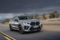 <p>The X6 M seen here benefits from the same exterior changes as the X5 M, except it alone has a black spoiler on its front lip.</p>