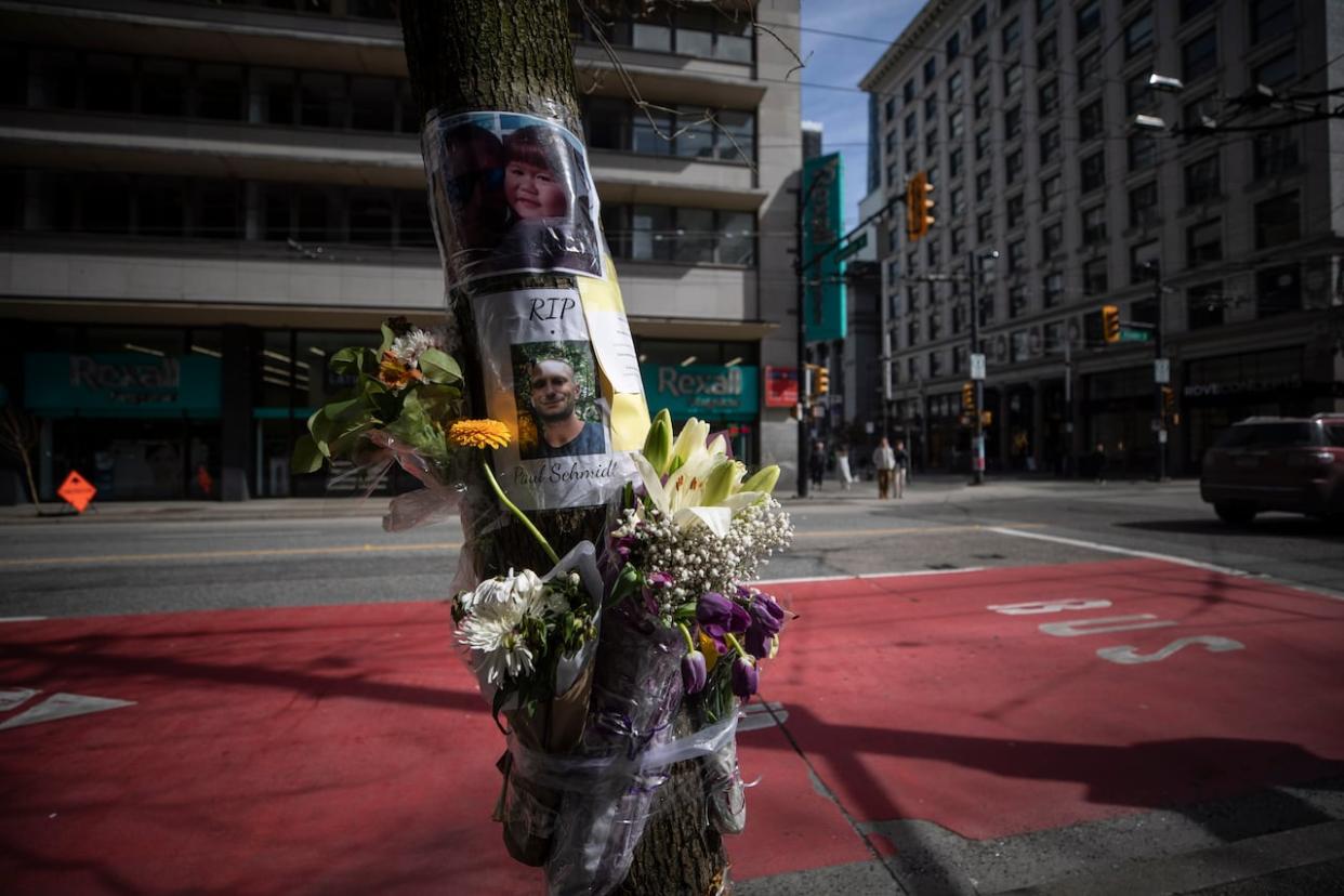 A memorial to Paul Schmidt is pictured near Granville and Pender streets in downtown Vancouver on March 29.  (Ben Nelms/CBC - image credit)