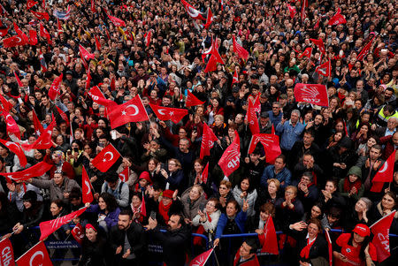 FILE PHOTO: Supporters of main opposition Republican People's Party (CHP) wave flags as they listen to mayoral candidate Ekrem Imamoglu during a gathering in Istanbul, Turkey, April 12, 2019. REUTERS/Murad Sezer/File Photo