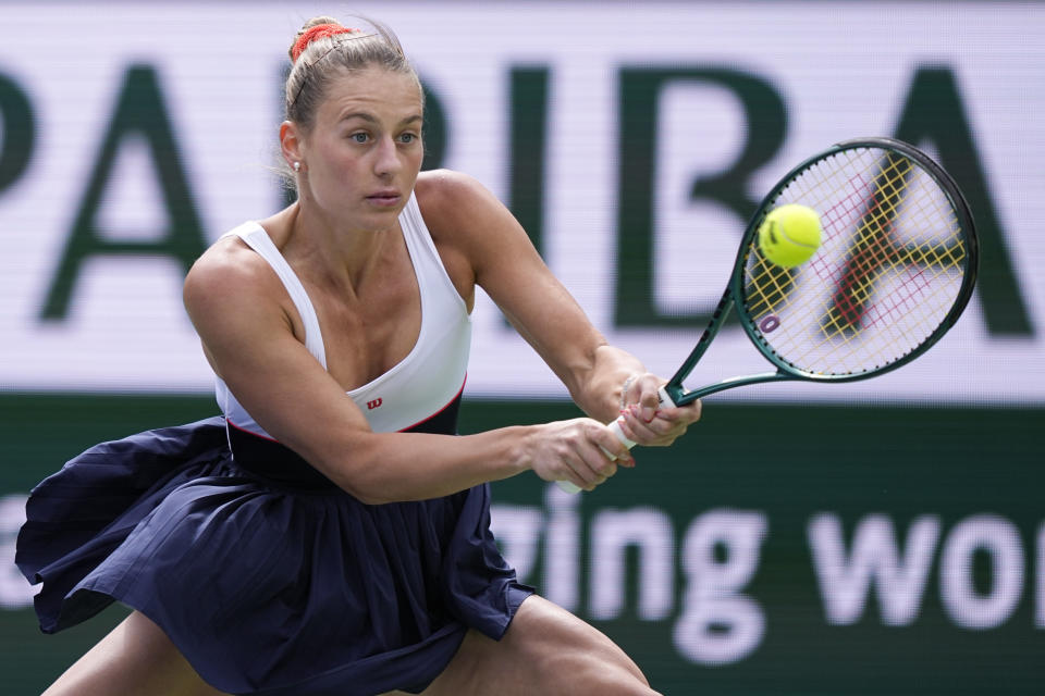 Marta Kostyuk, of Ukraine, returns to Anastasia Potapova, of Russia, during a quarterfinal match at the BNP Paribas Open tennis tournament, Thursday, March 14, 2024, in Indian Wells, Calif. (AP Photo/Mark J. Terrill)