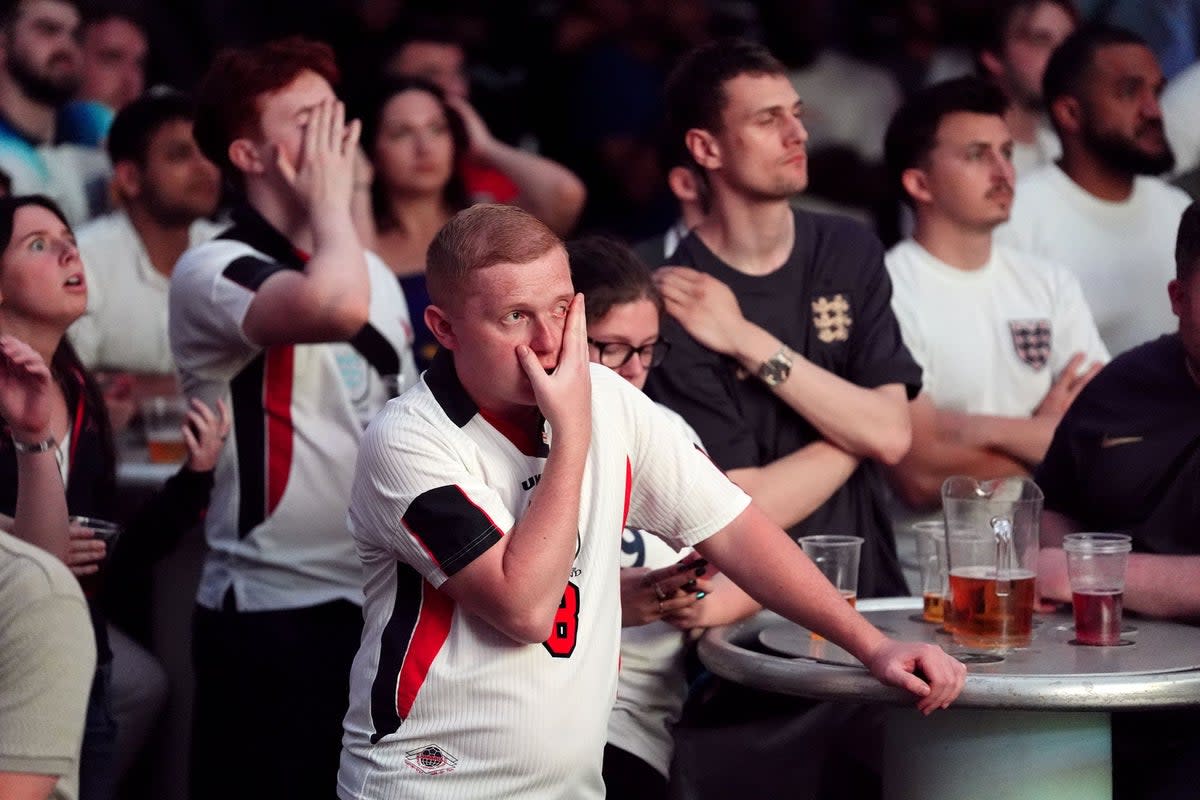 Exasperated England fans in Greenwich watch a screening of the UEFA Euro 2024 Group C match between England and Slovenia (Zac Goodwin/PA Wire)