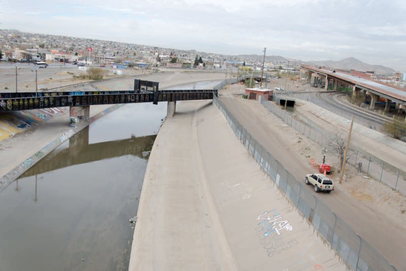 The border between El Paso, Texas, and Juarez, Mexico, is separated by the Rio Grande River and a chain link fence on the U.S. side as seen from the Paso Del Norte bridge in 2019. File Photo by Natalie Krebs/UPI