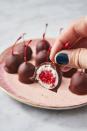 <p><em>Everyone </em>does <a href="https://www.delish.com/cooking/recipe-ideas/recipes/a58094/how-to-make-chocolate-covered-strawberries/" rel="nofollow noopener" target="_blank" data-ylk="slk:chocolate-covered strawberries;elm:context_link;itc:0;sec:content-canvas" class="link ">chocolate-covered strawberries</a>. Go above and beyond with chocolate cherries. (Don't worry, they're actually stupid easy to make.) Warning: These adorable little bites are so sweet, they're almost like candy!</p><p>Get the <strong><a href="https://www.delish.com/holiday-recipes/valentines-day/a25808298/chocolate-covered-cherries-recipe/" rel="nofollow noopener" target="_blank" data-ylk="slk:Chocolate-Covered Cherries recipe;elm:context_link;itc:0;sec:content-canvas" class="link ">Chocolate-Covered Cherries recipe</a></strong>. </p>