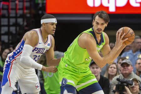 Mar 30, 2019; Minneapolis, MN, USA; Minnesota Timberwolves forward Dario Saric (36) backs towards the basket as Philadelphia 76ers forward Tobias Harris (33) plays defense in the first half at Target Center. Mandatory Credit: Jesse Johnson-USA TODAY Sports