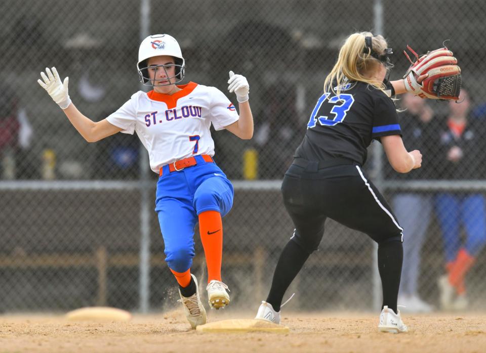 St. Cloud's Aubrey Preisler slides into second during the first game of a doubleheader Tuesday, May 17, 2022, at Sartell High School.