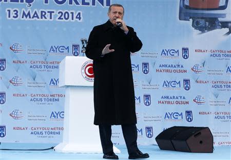 Turkey's Prime Minister Tayyip Erdogan addresses the crowd during an opening ceremony of a new metro line in Ankara March 13, 2014. REUTERS/Umit Bektas