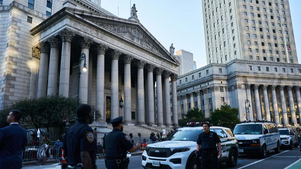 New York Police Department officers outside the New York State Supreme Court Building in New York, NY on Monday, October 2, 2023. Donald Trump will face off against New York Attorney General Letitia James starting today in a contentious civil trial that threatens his control over his real estate empire in the state.