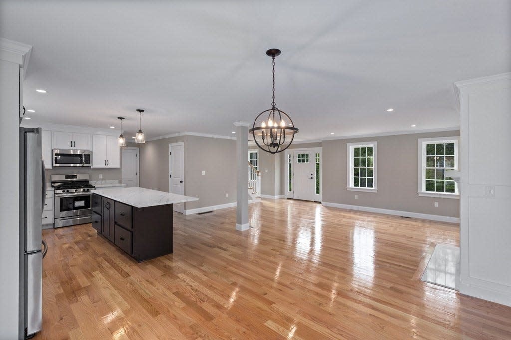 This house at 76 Tiffany Drive in Brockton sold for $755,000 on Aug. 18, 2023. The family room, dinning room and kitchen all have hardwood floors and the family room has gas fireplace, according to the real estate listing.