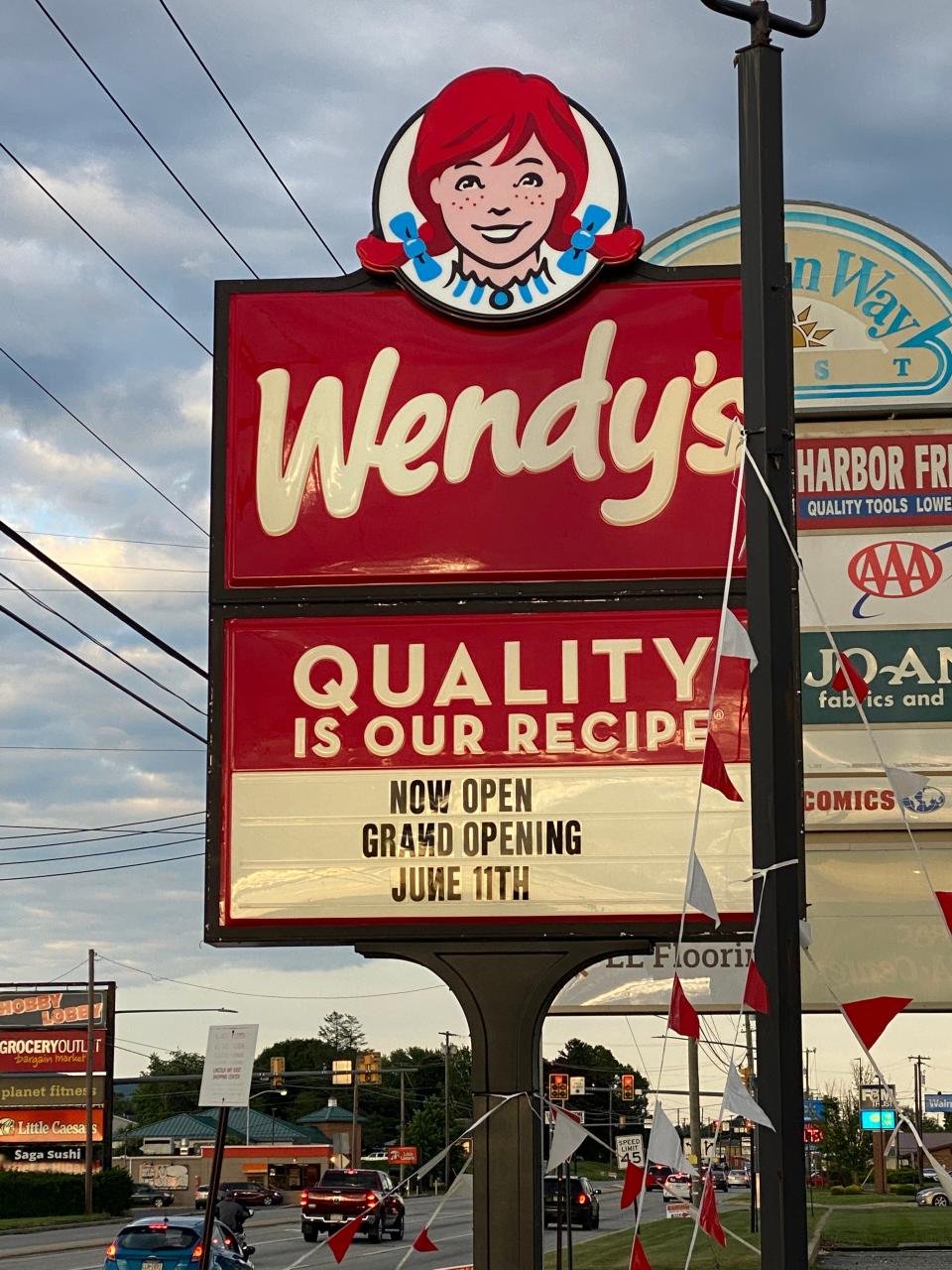 Wendy's roadside sign advertises the June 11 celebration for the re-opening.