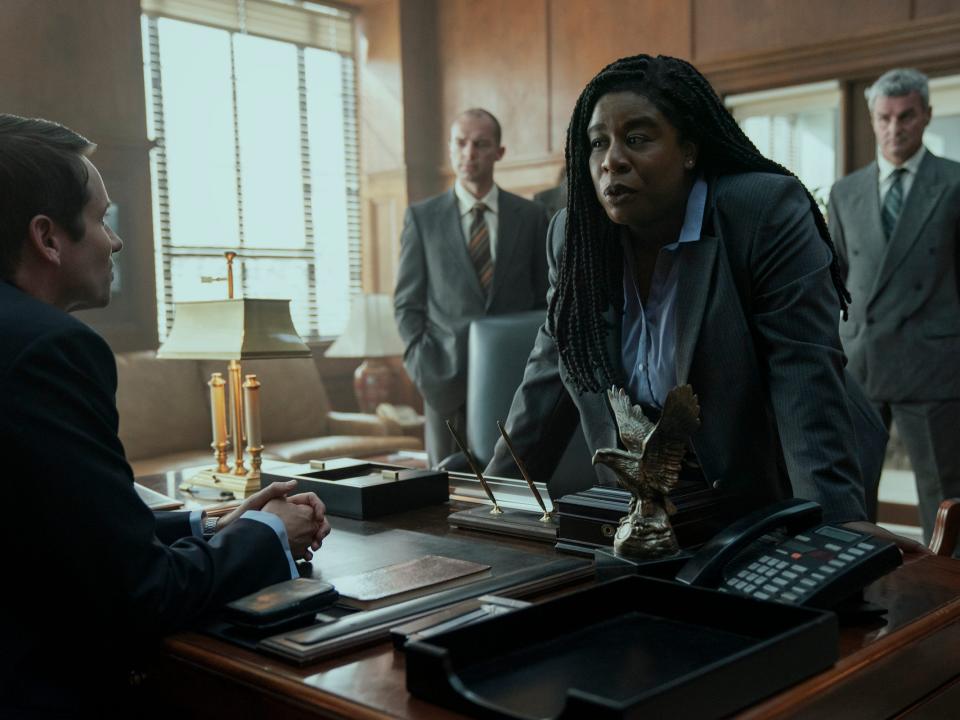 Tyler Ritter and Uzo Aduba on Netflix's "Painkiller."