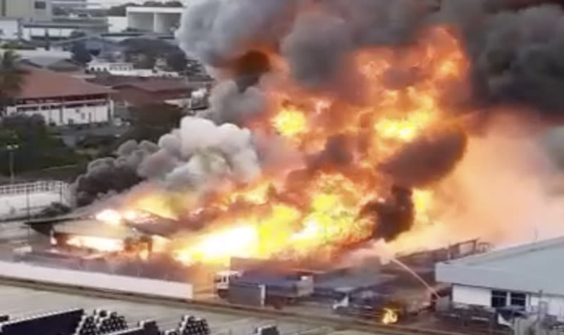 The blaze at 43 Jalan Buroh. (Screencap of Yahoo News Singapore reader video)