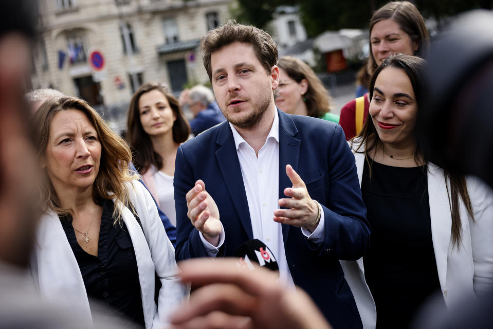 FILE - Member of Green Party Julien Bayou, center, arrives at the National Assembly, Paris, France, Tuesday, June 21, 2022. French lawmaker Julien Bayou stepped aside from the co-presidency of the Europe Ecology-The Greens party at the National Assembly after a woman accused him of sexual misconduct. Bayou has not commented on the allegation and is waiting for his party's ruling on his future role. (AP Photo/Thomas Padilla, File)