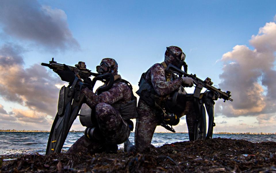 US Navy SEAL special-warfare operators in training. It's likely that there are SEALs aboard the submarine USS Florida, known to have passed through the Suez Canal into the Red Sea recently