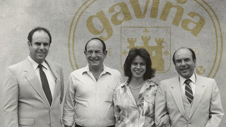 Paco, Pedro, José, and Leonor Gavina pose together 