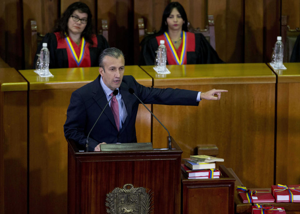 FILE - In this March 3, 2017 file photo, Venezuela's Vice President Tareck El Aissami, center, delivers his state of the nation report at the Supreme Court in Caracas, Venezuela. Charges were unsealed Friday, March 8, 2019 against the former Venezuelan vice president in New York federal court as authorities accused him of using his office to aid international drug traffickers. (AP Photo/Ariana Cubillos, File)