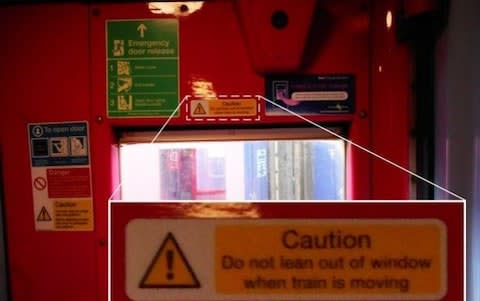 The warning sign on the train did not 'adequately' reflect the level of danger, the report found - Credit: PA