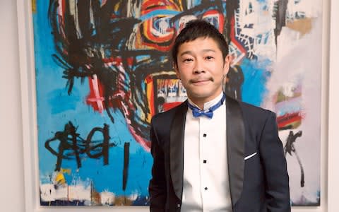 Yusaku Maezawa is the billionaire with a Basquiat behind the Zozosuit - Credit: Rex Features