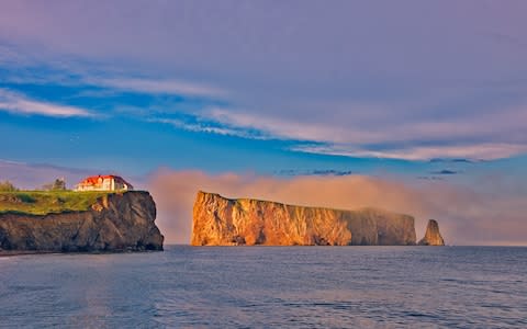 Rocher Perce in the Gulf of St Lawrence on the tip of the Gaspe Peninsula in Quebec - Credit: Getty