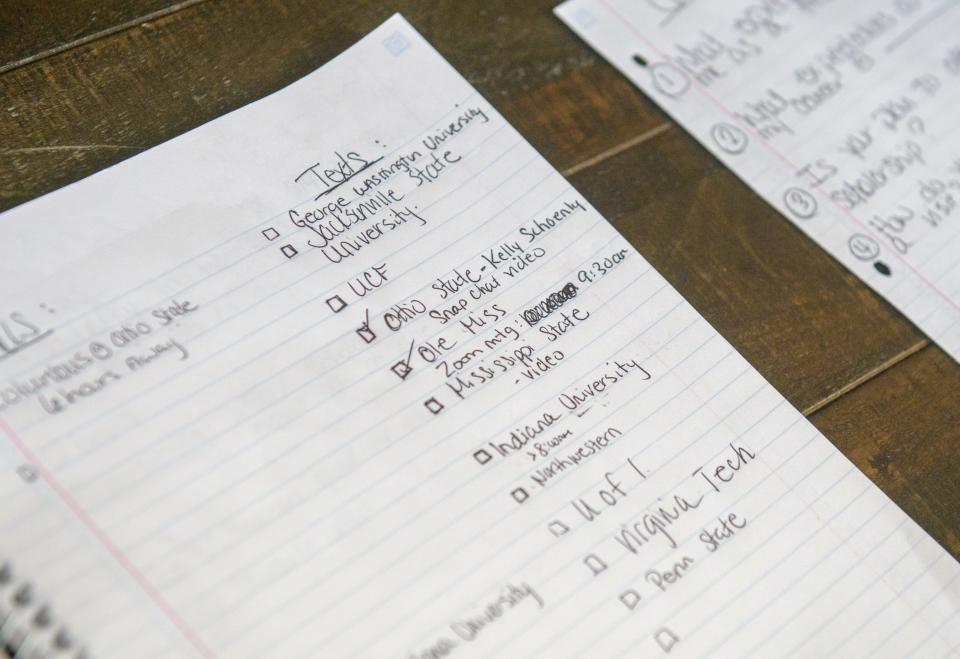 The Tills keep a notebook of notes, questions and schedules for college recruiting.
