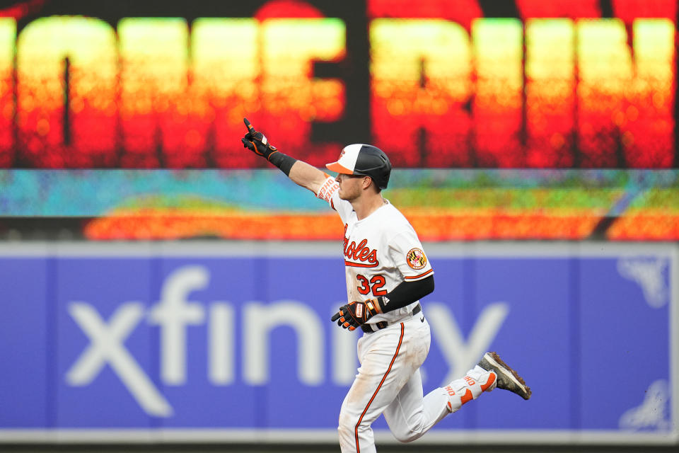 Baltimore Orioles' Ryan O'Hearn reacts while running the bases after hitting a two-run home run to score Anthony Santander during the third inning of a baseball game against the Toronto Blue Jays, Tuesday, June 13, 2023, in Baltimore. (AP Photo/Julio Cortez)