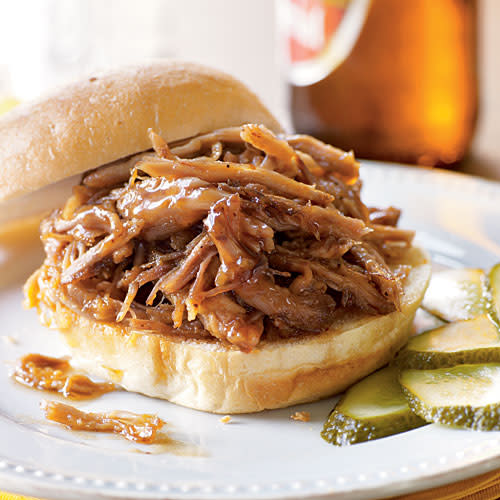 <p>The slow cooker makes easy work of this pulled pork recipe. Serve on hamburger buns, if desired, for a hearty and satisfying sandwich.</p> <p><a rel="nofollow noopener" href="http://www.myrecipes.com/recipe/slow-roasted-pulled-pork" target="_blank" data-ylk="slk:View Recipe: Slow-Roasted Pulled Pork;elm:context_link;itc:0;sec:content-canvas" class="link ">View Recipe: Slow-Roasted Pulled Pork</a></p>