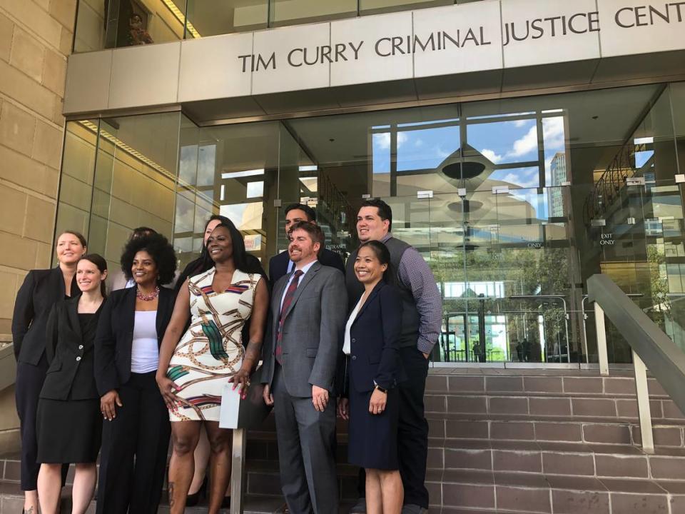 Crystal Mason, who was convicted of illegal voting in March 2018, and her legal team stand outside the Tim Curry Criminal Justice Center Sept. 10, 2019, after an appeal hearing in Fort Worth.