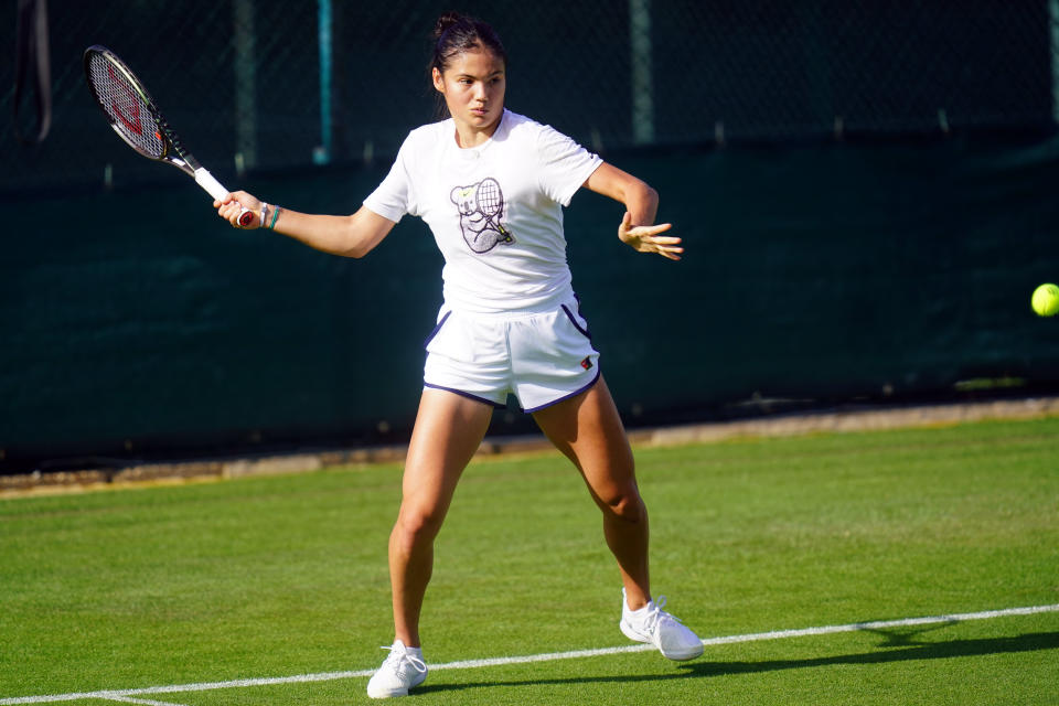 Emma Raducanu (pictured) hit a forehand during a practice session ahead at Wimbledon.