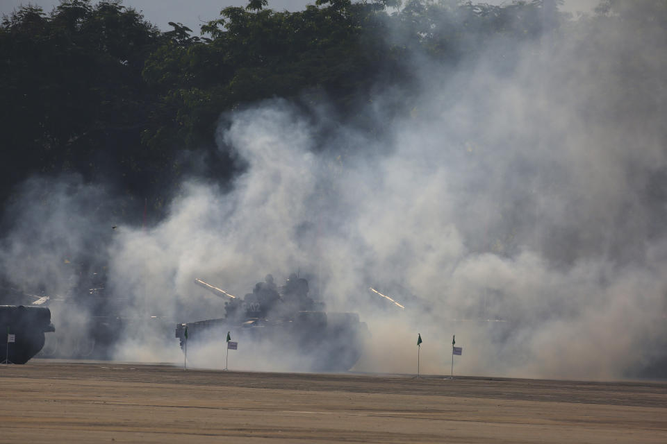 Myanmar military tanks are driven during a parade to commemorate Myanmar's 78th Armed Forces Day in Naypyitaw, Myanmar, Monday, March 27, 2023. (AP Photo/Aung Shine Oo)