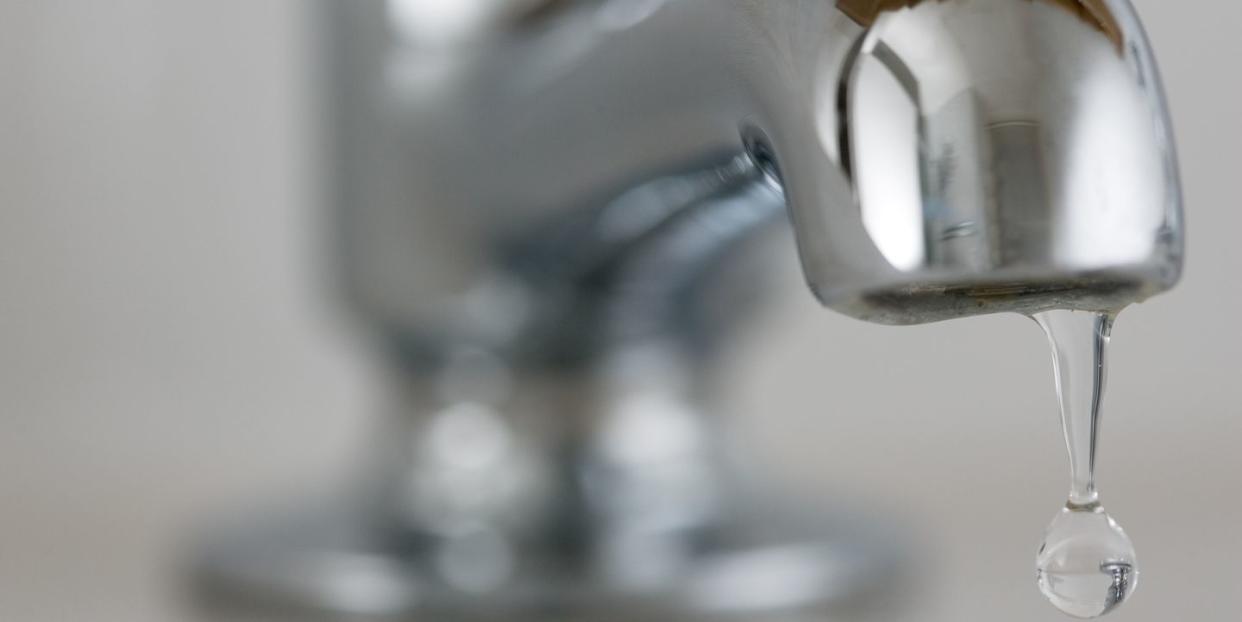 Water Drips From Domestic Tap, UK