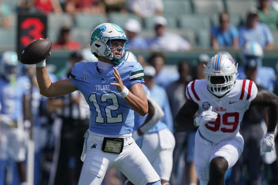 Tulane quarterback Kai Horton (12) passes in the first half of an NCAA college football game against Mississippi in New Orleans, Saturday, Sept. 9, 2023. (AP Photo/Gerald Herbert)