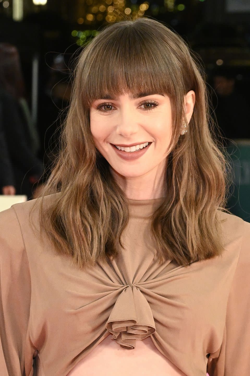 paris, france december 06 lily collins attends the emily in paris by netflix season 3 world premiere at theatre des champs elysees on december 06, 2022 in paris, france photo by stephane cardinale corbiscorbis via getty images