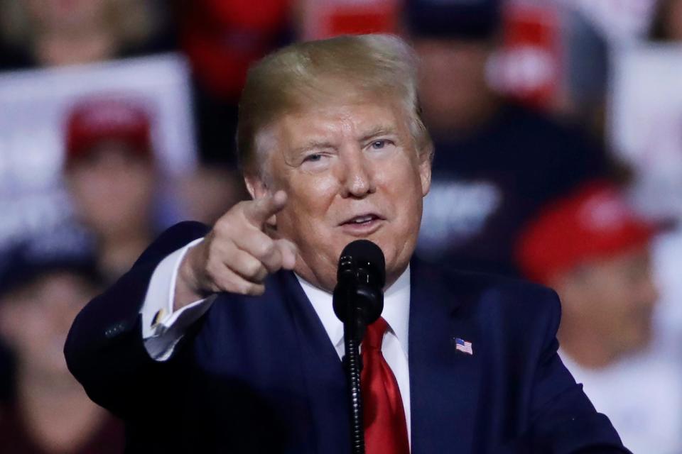 President Donald Trump speaks at a campaign rally in Manchester, New Hampshire.