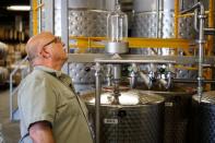 Herman Mihalich checks up on the most recent batch of rye whisky in his distillery in Bristol Pennsylvania