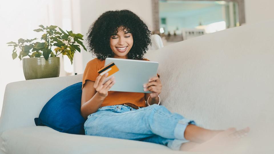 young woman using a store credit card