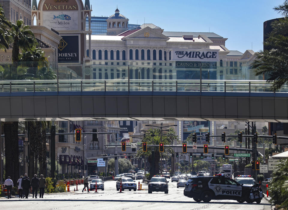 Police work at the scene where multiple people were stabbed in front of a Strip casino in Las Vegas, Thursday, Oct. 6, 2022. (Rachel Aston/Las Vegas Review-Journal via AP)