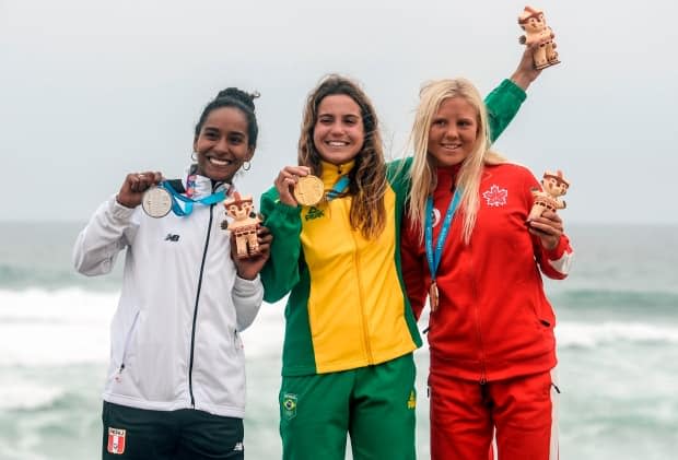 Olin, right, on the podium at the 2019 Pan Am Games in Lima.