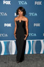 <p>The 59-year-old actress looked spectacular in a strapless, black jumpsuit. <em>[Photo: Getty]</em> </p>