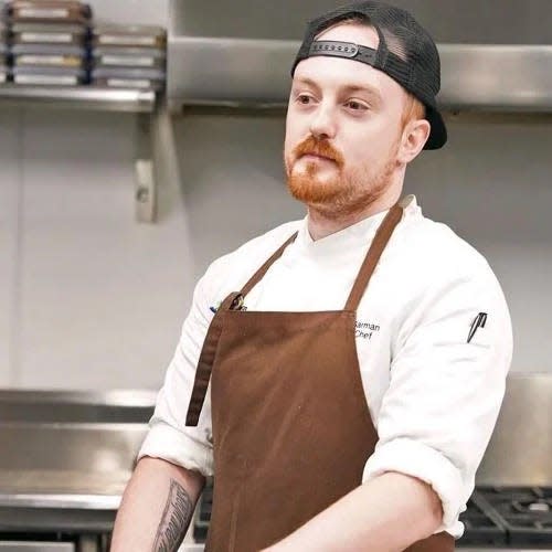 The Boston Bruins held a moment of silence in memory of head chef Keith Garman before Saturday's home opener.