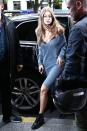 <p>Gigi Hadid took things to casual-chic territory in Paris, mixing a knit C/meo dress with a lacy black bra peeking out from underneath. </p>