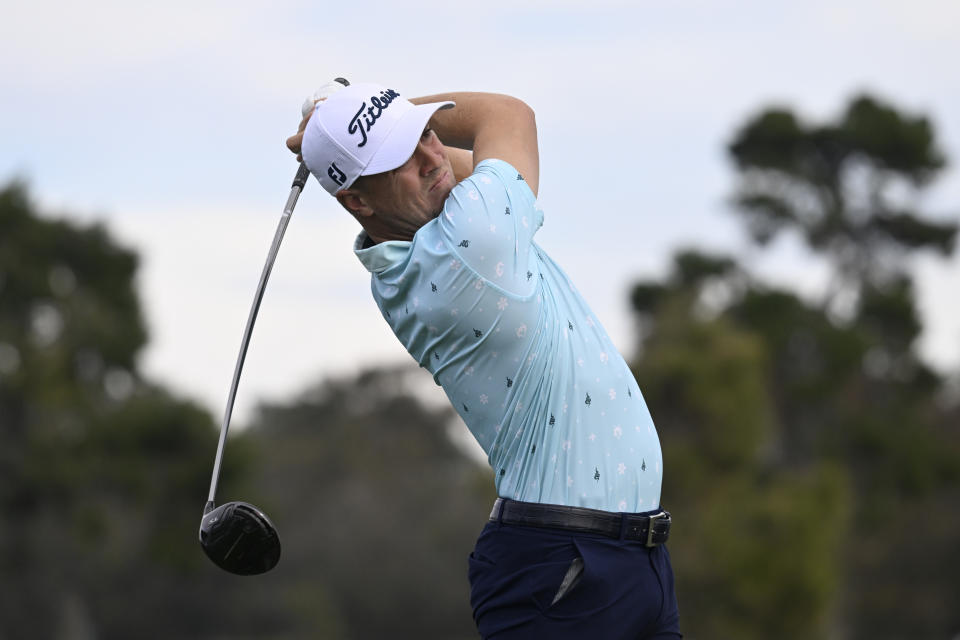 Justin Thomas hits his tee shot on the second hole of the South Course during the third round of the Farmers Insurance Open golf tournament, Friday Jan. 28, 2022, in San Diego. (AP Photo/Denis Poroy)