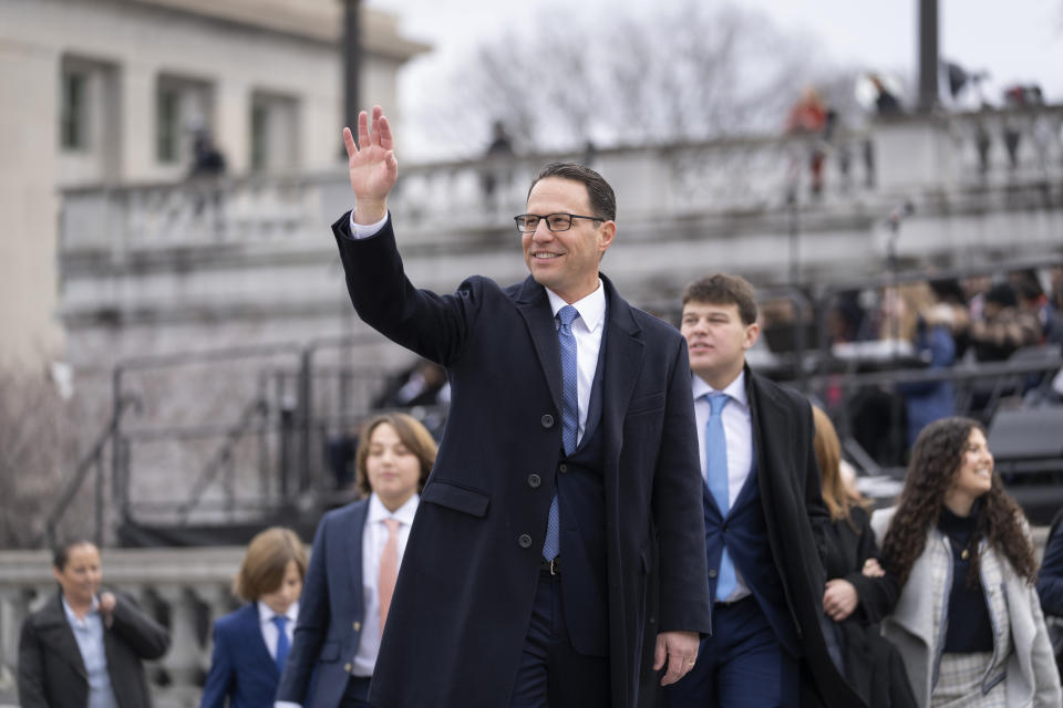 Democratic Gov. Josh Shapiro waves after a ceremony to become Pennsylvania's 48th governor, Tuesday, Jan. 17, 2023, at the state Capitol in Harrisburg, Pa. (AP Photo/Matt Rourke)