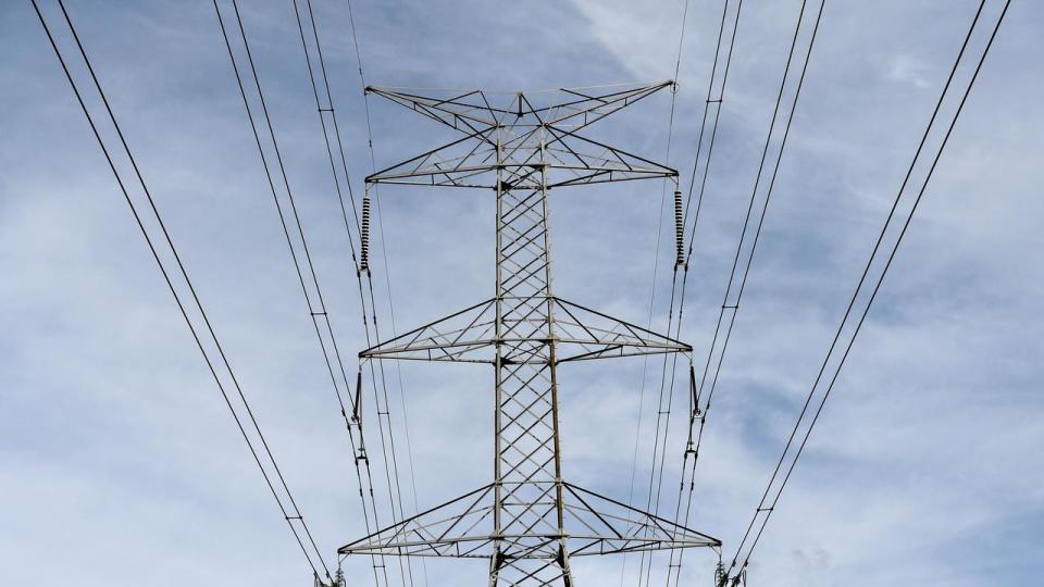 Households across NSW, southeast Queensland and South Australia will be affected when electricity prices increase by between 21 and 24 per cent from July 1. Picture: AAP Image/Brendan Esposito