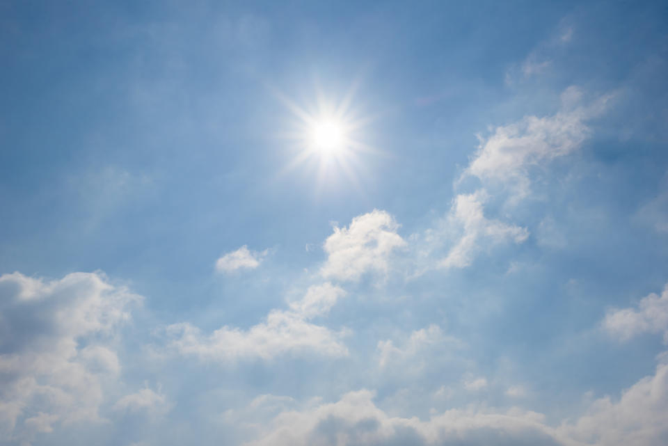 The sun shines brightly in the blue sky. Many Canadians believe misinformation about sun exposure, like that you need to burn to get a tan, but that can be dangerous. (Image via Getty)