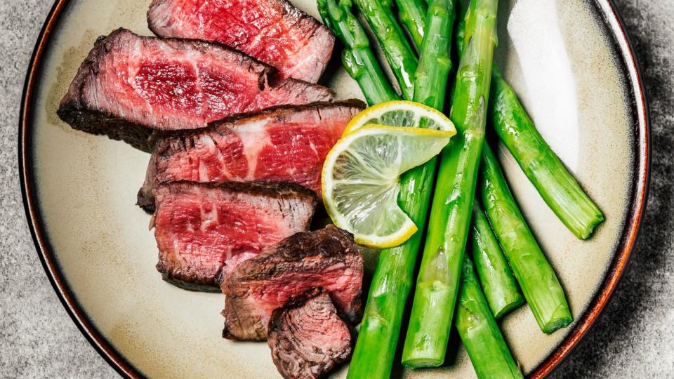 PHOTO: Sliced steak with asparagus is pictured in this undated stock photo. (STOCK PHOTO/Getty Images)