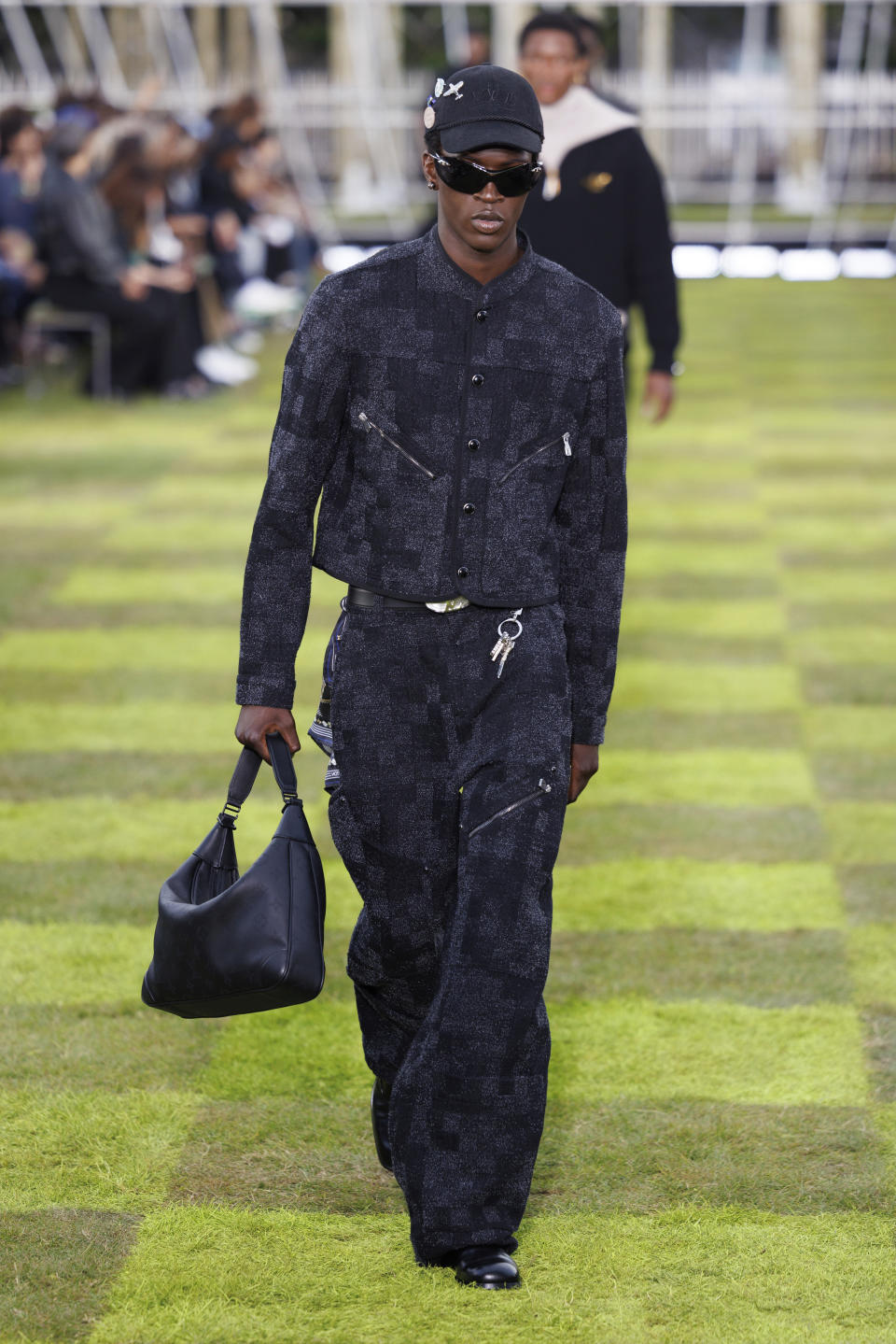 A model wears a creation as part of the Louis Vuitton Spring Summer 2025 collection, that was presented in Paris, France, Tuesday, June 18, 2024. (Photo by Vianney Le Caer/Invision/AP)