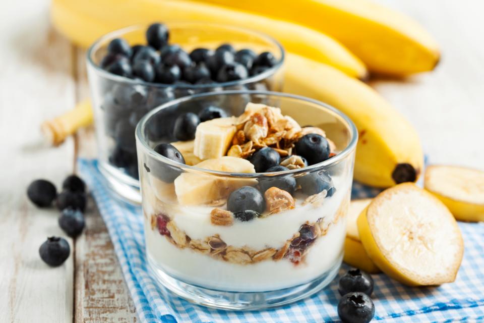 Yogurt with homemade granola, banana and blueberries. Healthy breakfast. (Photo by: Anjelika Gretskaia/REDA&CO/Universal Images Group via Getty Images)